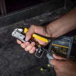 KLEIN TOOLS Heavy-Duty Multi-Connector Compression Crimper - showing someone using the crimper with the tool closed just after the crimp