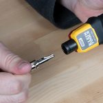 KLEIN TOOLS Impact Punch-down Tool - showing end being put in place.