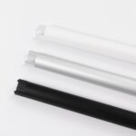 BOSSCOM Cable Covers 18mm showing three colours: black, aluminium and white shown from above.