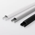 BOSSCOM Cable Covers 18mm showing three colours: black, aluminium and white shown from the side.