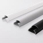 BOSSCOM Cable Covers 33mm showing three colours: black, aluminium and white shown from the side.