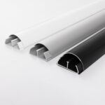 BOSSCOM Cable Covers 50mm showing three colours: black, aluminium and white shown from the side.