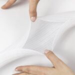 BOSSCOME Self-closing Wrap showing the white version of the wrap being held open