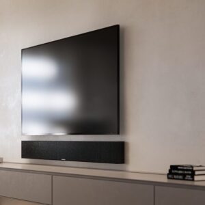 Garvan Aria on-wall soundbar shown mounted on a wall below a TV screen